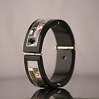 Sterling silver bracelet one of a kind with mother-of-pearl and horn.