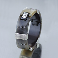 Sterling silver one of a kind bracelet with freshwater pearl and horn.